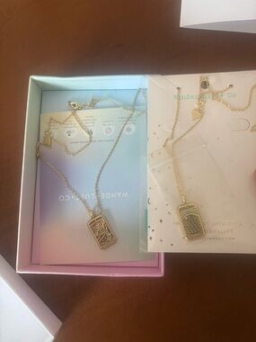 Wanderlust + Co Gold Engraved Tarot Card Pendant Necklace